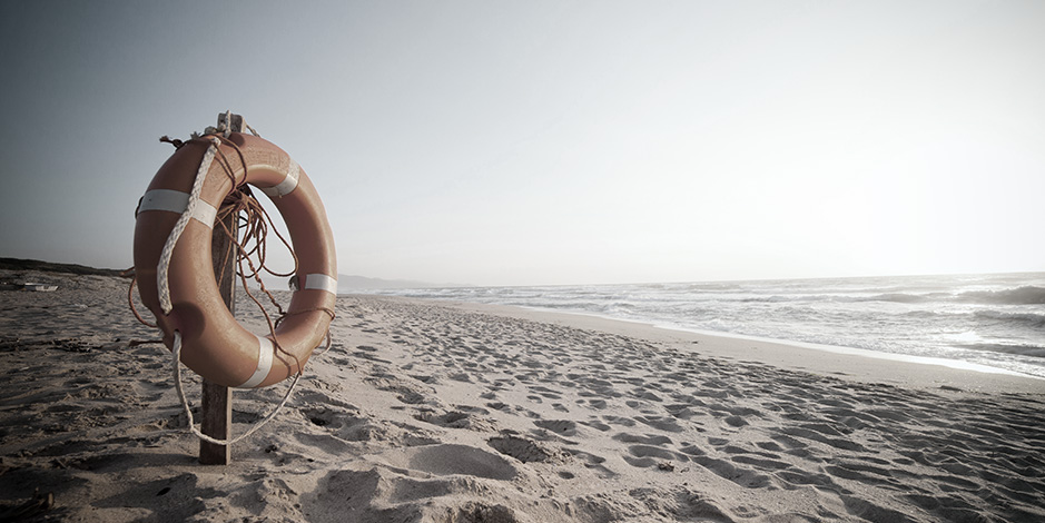 Life buoy in sunset